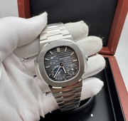 PATEK PHILIPPE WITH SWIZZ MACHINE
