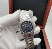 PATEK PHILIPPE WITH SWIZZ MACHINE