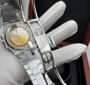 PATEK PHILIPPE WITH SWIZZ MACHINE